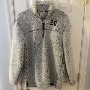 Unisex size Medium pullover sweater from Jostens with embroidered “20” on front